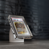 Phantom Display concrete base stand alternate angle showing fluted texture and magnetic ring mount