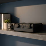 Phantom Display carry case opened showing custom-molded foam interior for graded card slabs