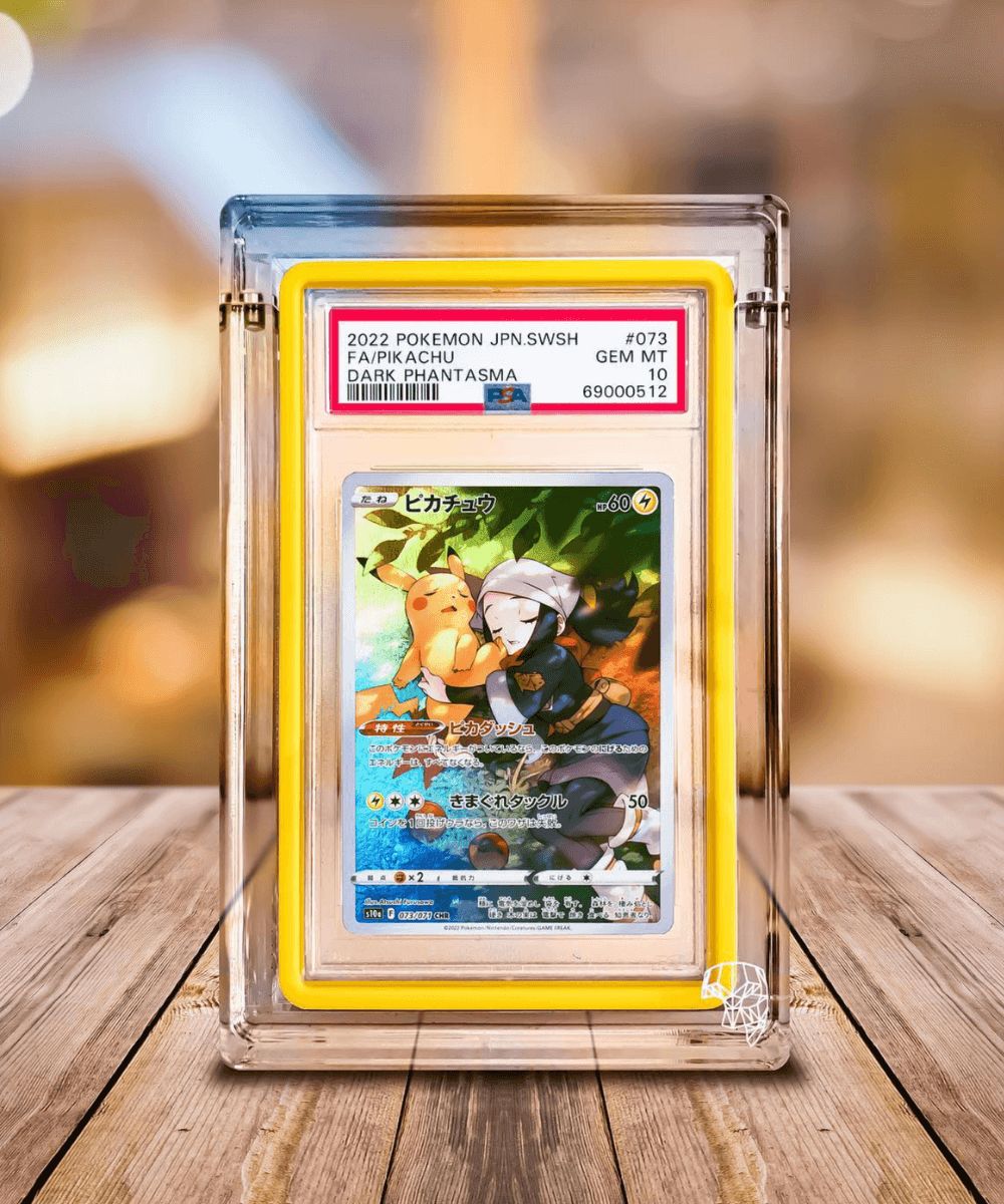 Pokemon PSA Card In GradedGuard And Phantom Display Collaboration Case Sitting On Table
