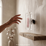 Hand effortlessly removing a graded PSA card from the Magneto magnetic wall mount, demonstrating the quick-swap feature.