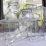 A stack of crystal-clear Phantom Display acrylic cases showcasing their premium design and transparency, perfect for protecting and displaying valuable collections.