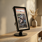 Phantom Display Magneto Color case in black with Prism faceted edges, holding PSA GEM MT 10 Palkia V Silver Tempest, mounted on Magneto Desk Stand #color_black