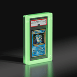 Side angle of a Phantom Display glow-in-the-dark slab case displaying a Japanese Basic Holo Blastoise card, graded GEM MT 10 by PSA, showcasing a ghostly glow effect. #authenticator_psa/cgc