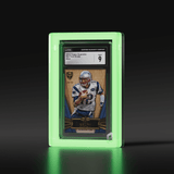 A Phantom Display glow-in-the-dark slab case housing a 2012 Topps Supreme Tom Brady Blue card, graded Mint 9 by CGC, glowing with a ghostly charm. #authenticator_psa/cgc