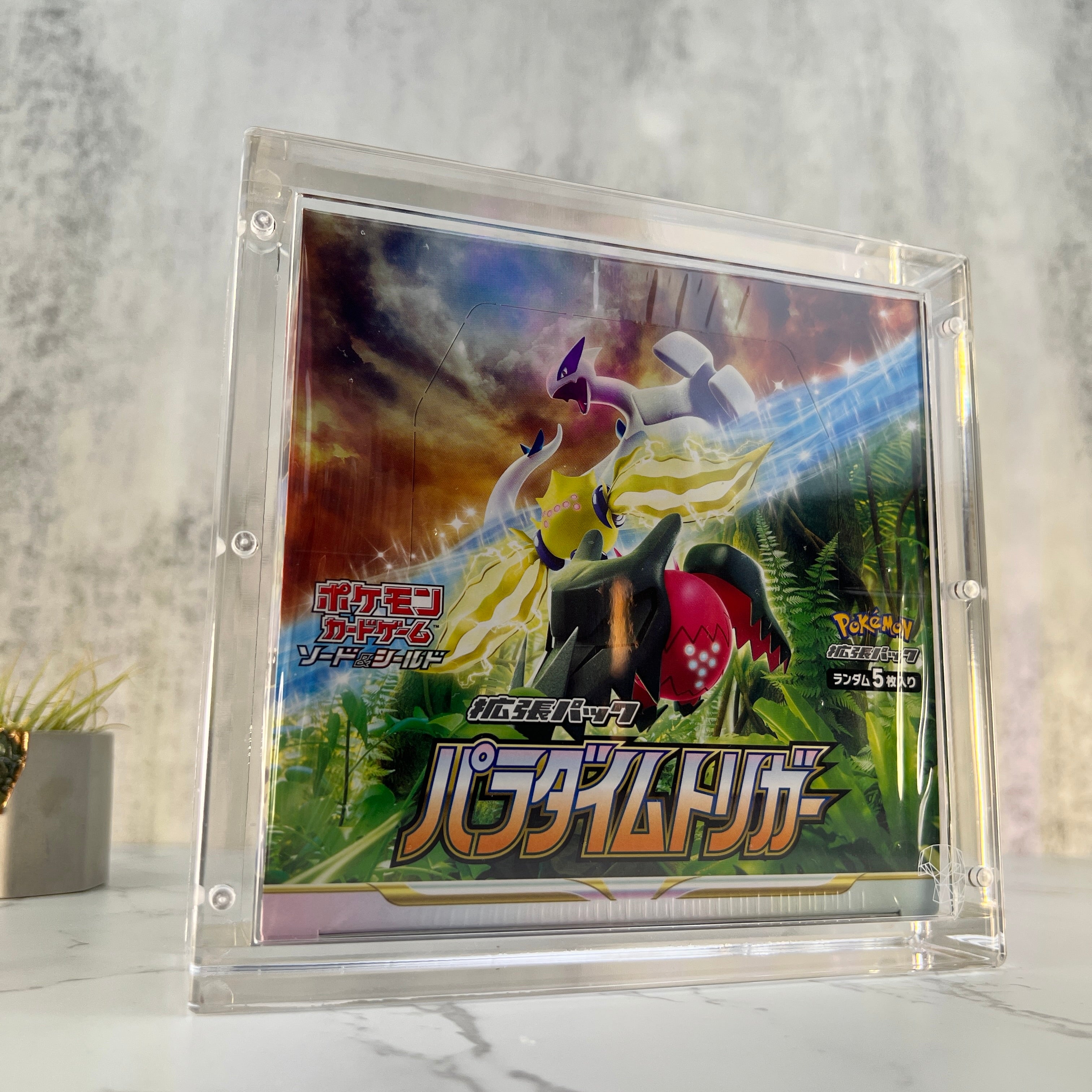 Ultra clear Pokemon Japanese booster box magnetic acrylic protective case, with crystal acrylic, with 99.6% UV protection against sun damage and fading. Fits Eevee Heroes, Scarlet & Violet and more.