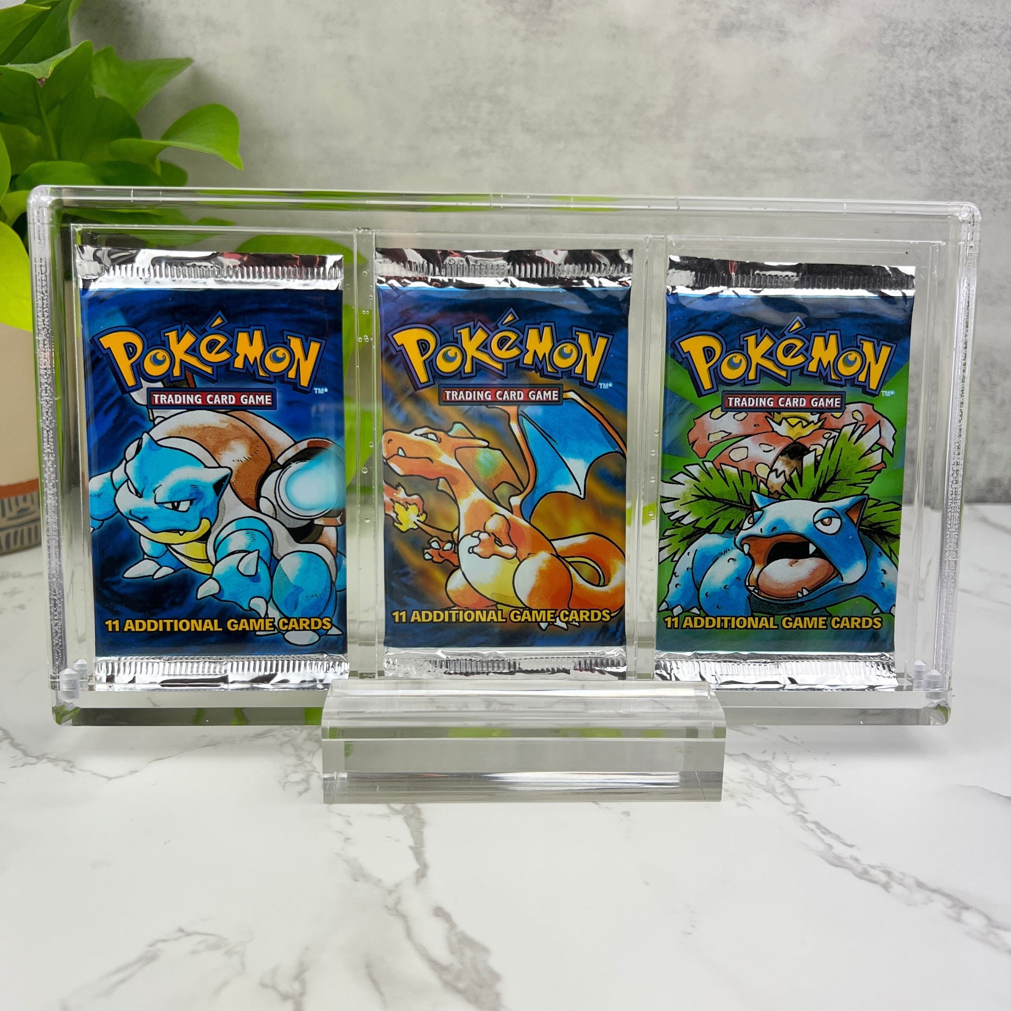 Triple Booster Pack Display Stand With Base Front View