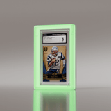 Angled view of CGC graded Tom Brady 2012 Topps Supreme card in a Phantom Display neon green acrylic case. #authenticator_psa/cgc