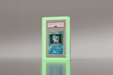 PSA graded 1996 Japanese Blastoise Holo card in a Phantom Display green acrylic case, rated Gem Mint 10, providing premium protection for Pokémon collectors.