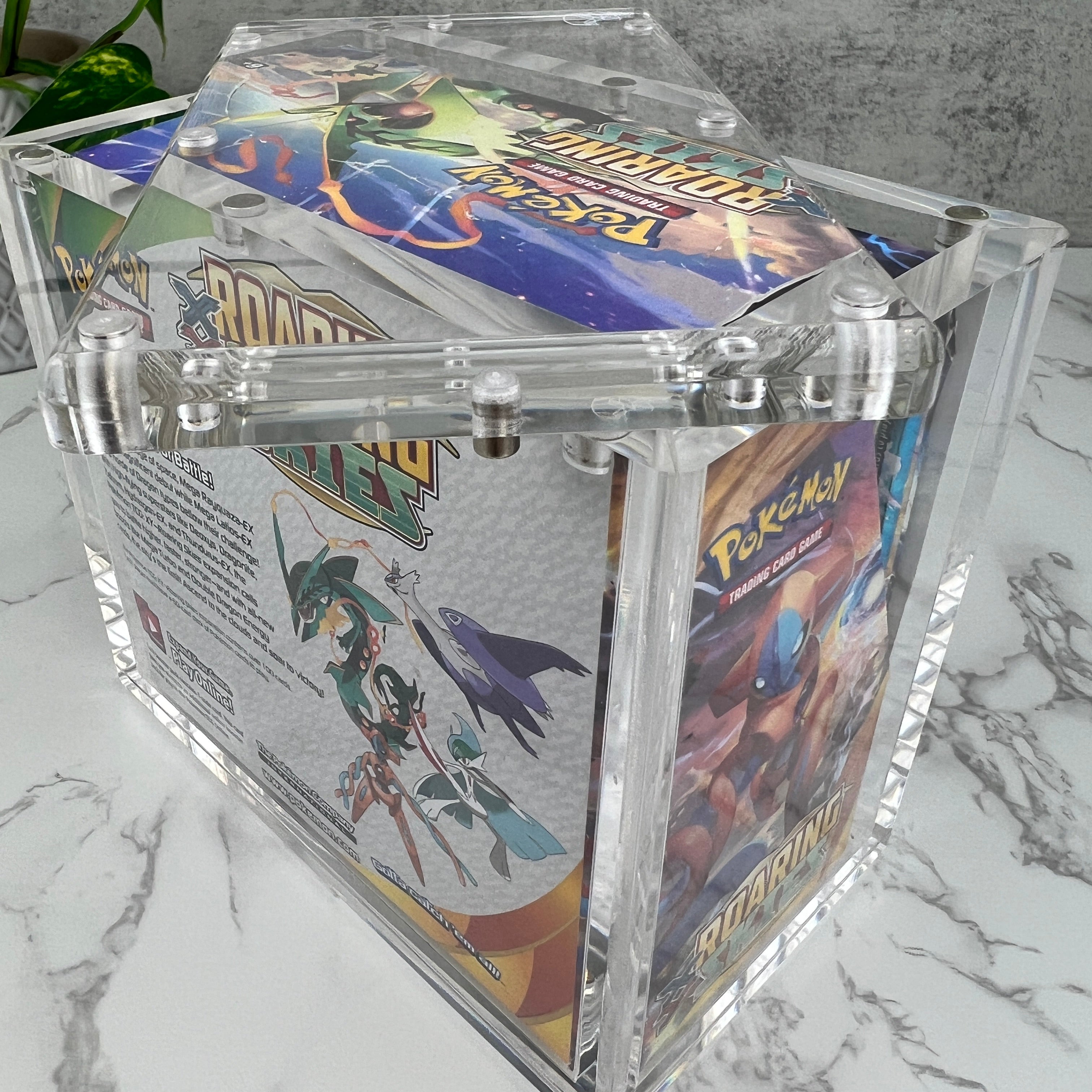 Pokemon Modern Booster Box magnetic acrylic protective case. Crystal clear acrylic, with UV resistance. Fits Diamond & Pearl, Platinum, HeartGold SoulSilver, Black & White, and XY Series